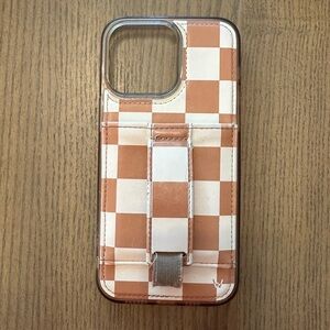 Fits 2 cards in the pocket. The elastic band is a little stretched out